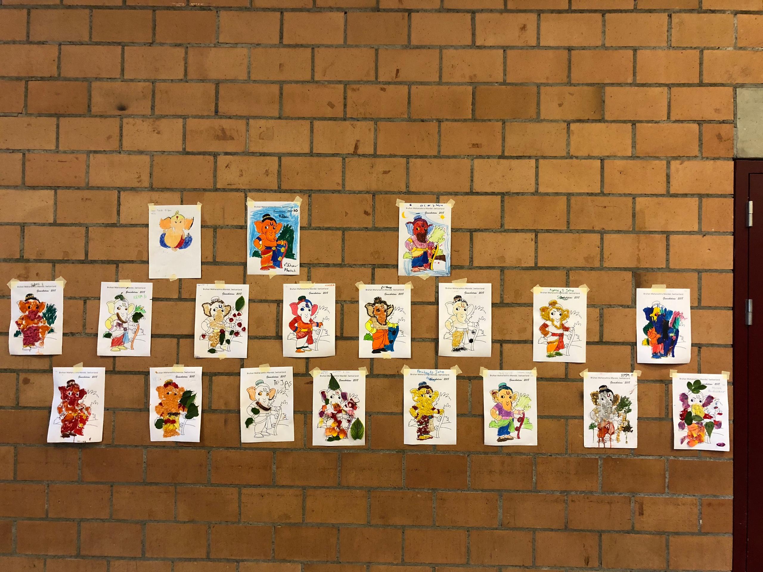 A collage of Ganesh pictures coloured in by kids.