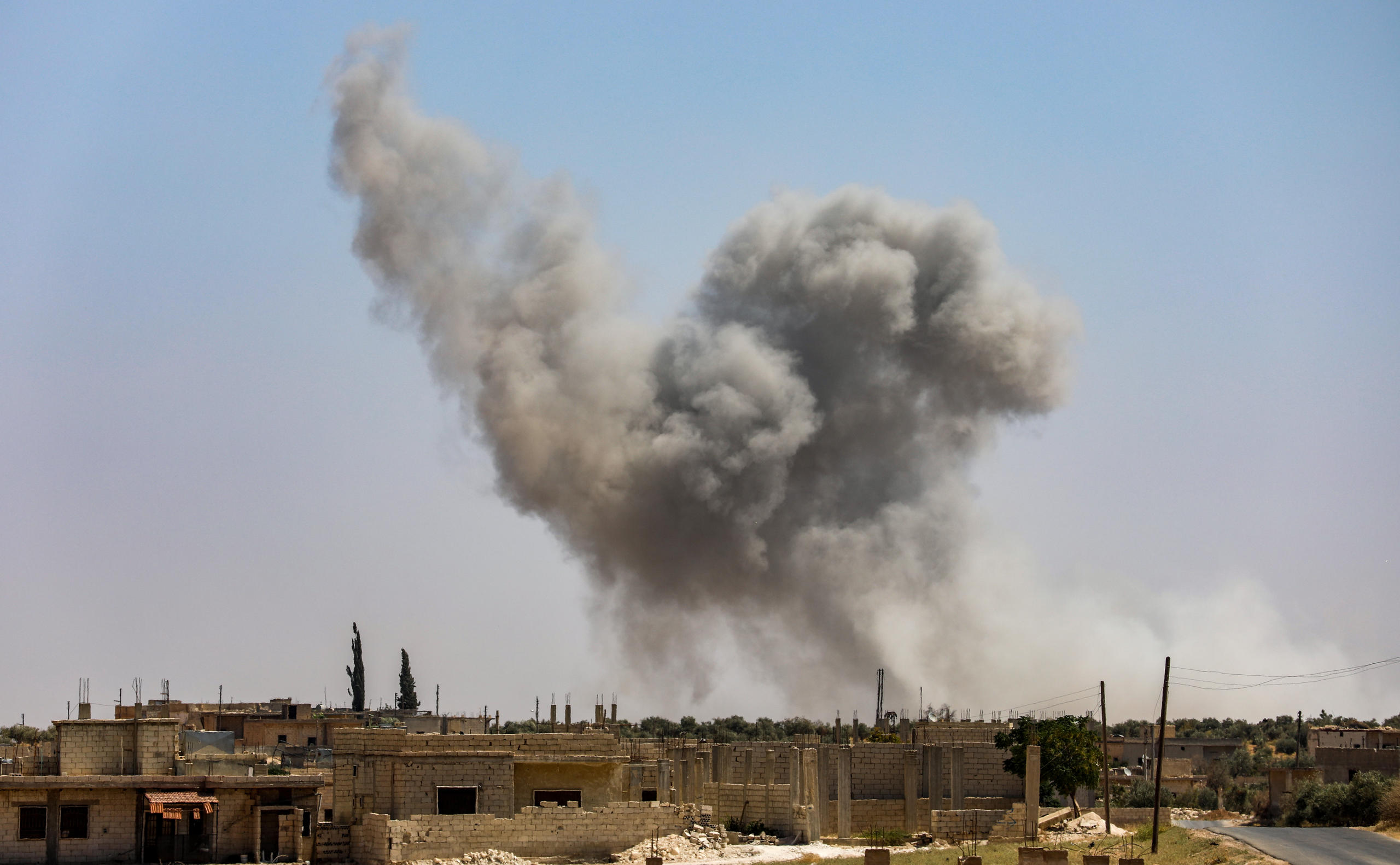 Syrian government forces bombardment of the town of al-Tamana