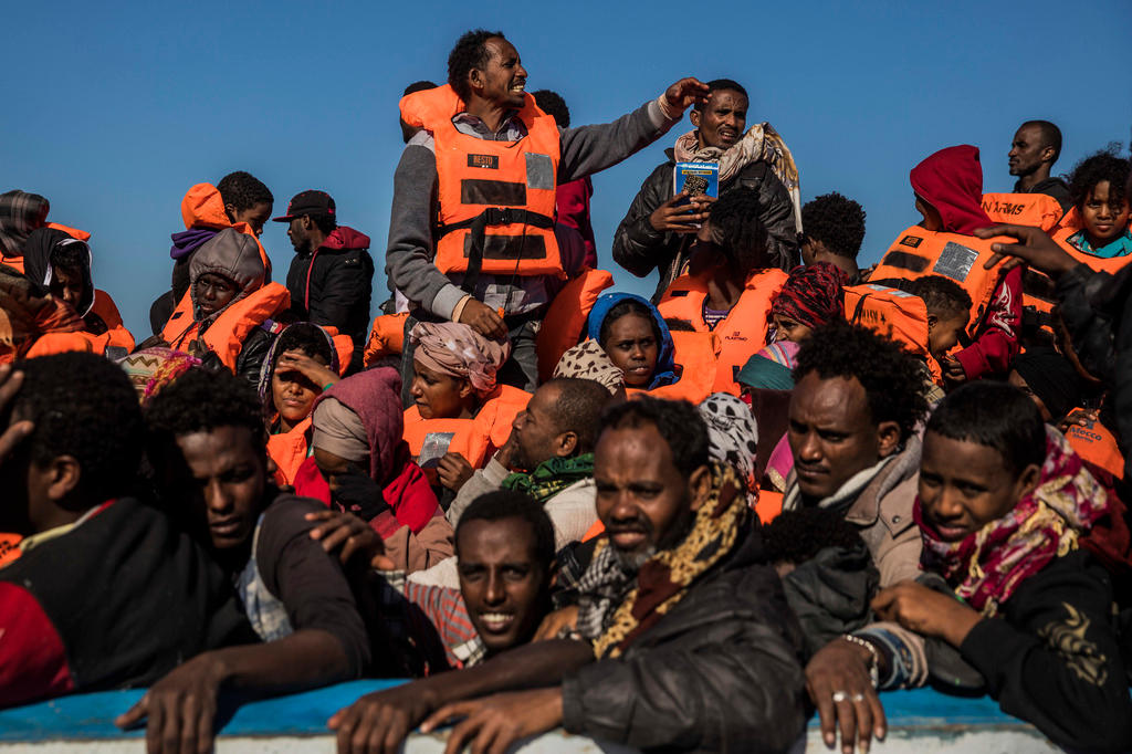 Boat carrying migrants off the coast of Libya