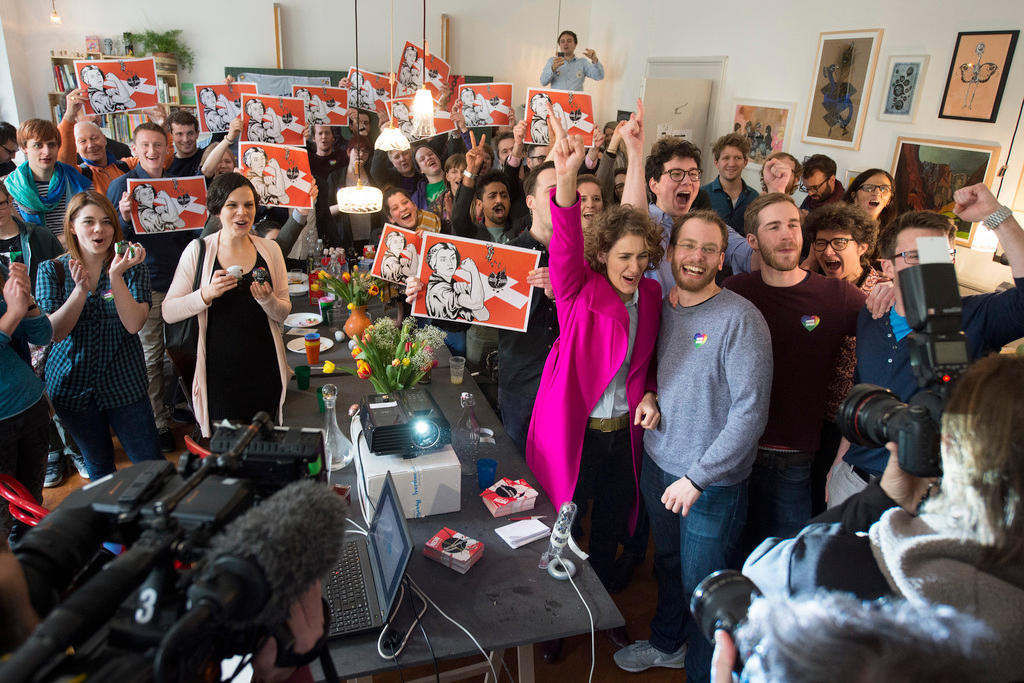 NGO Operation Libero members cheer result of the 2016 vote on a hardline initative