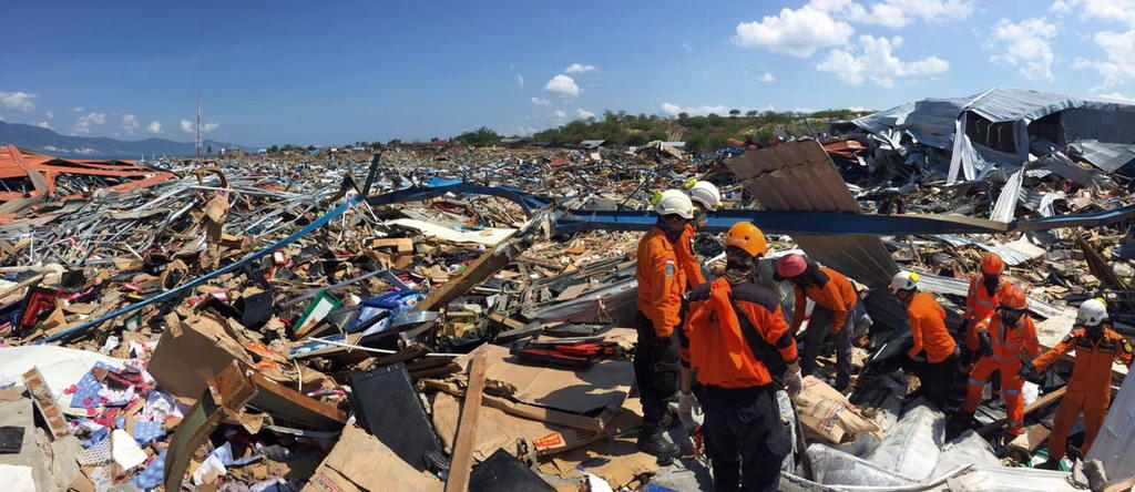 Rescuers search for quake victims in Palu, Indonesia