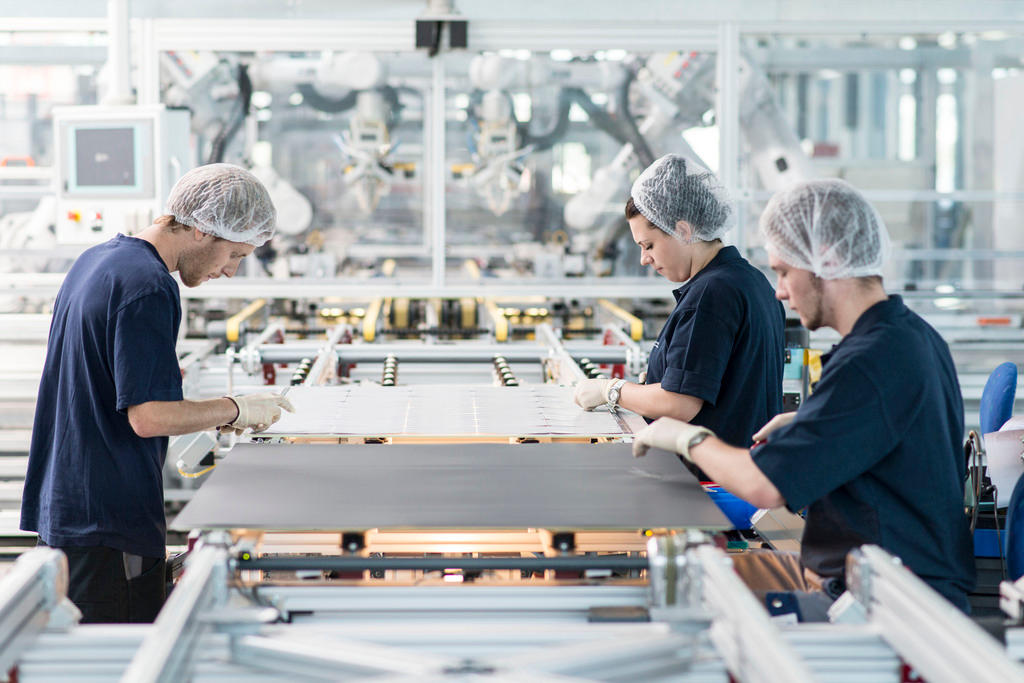 People in solar plant