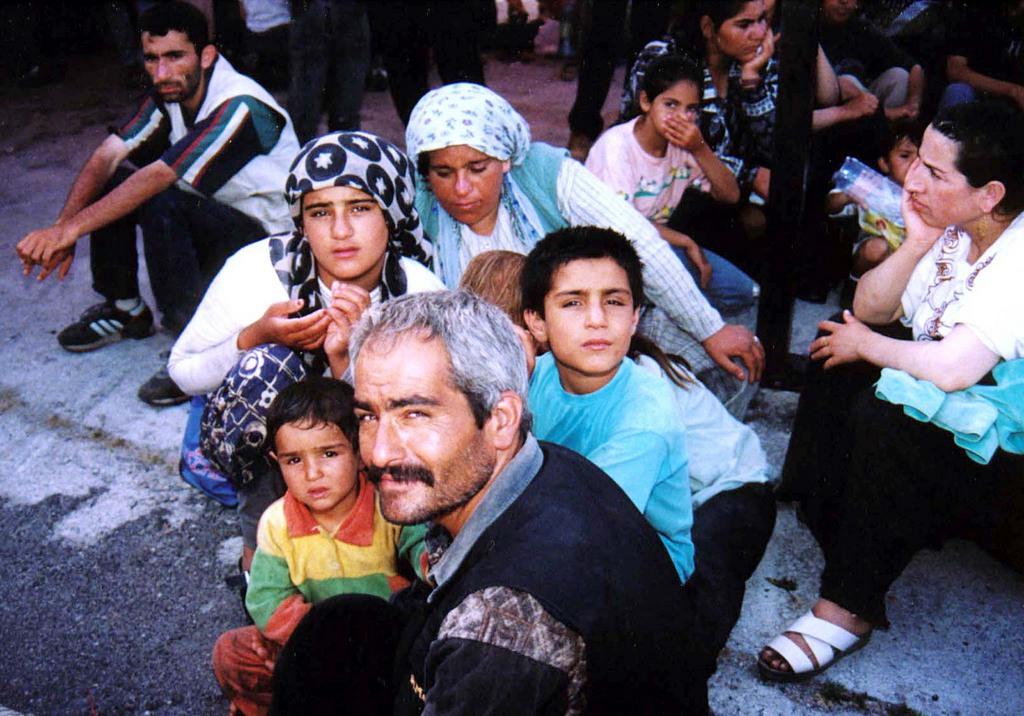 Nell immagine d archivio, immigrati curdi giunti a Riace