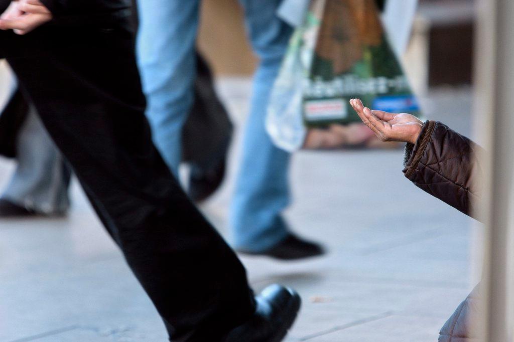 beggar with hand out