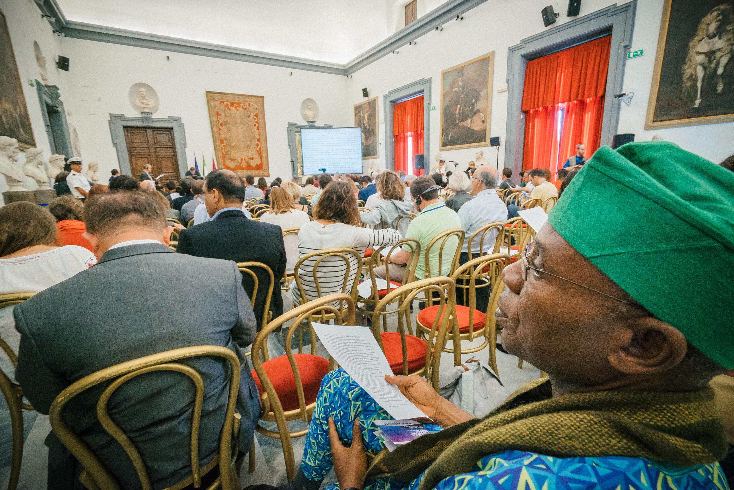 A participant at the Rome Forum holds a copy of the Magna Charta in his hand