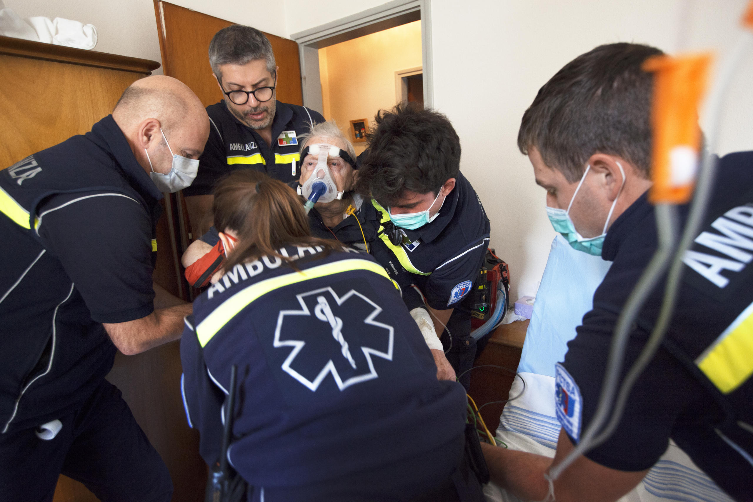 Ambulance loading patinet on stretcher