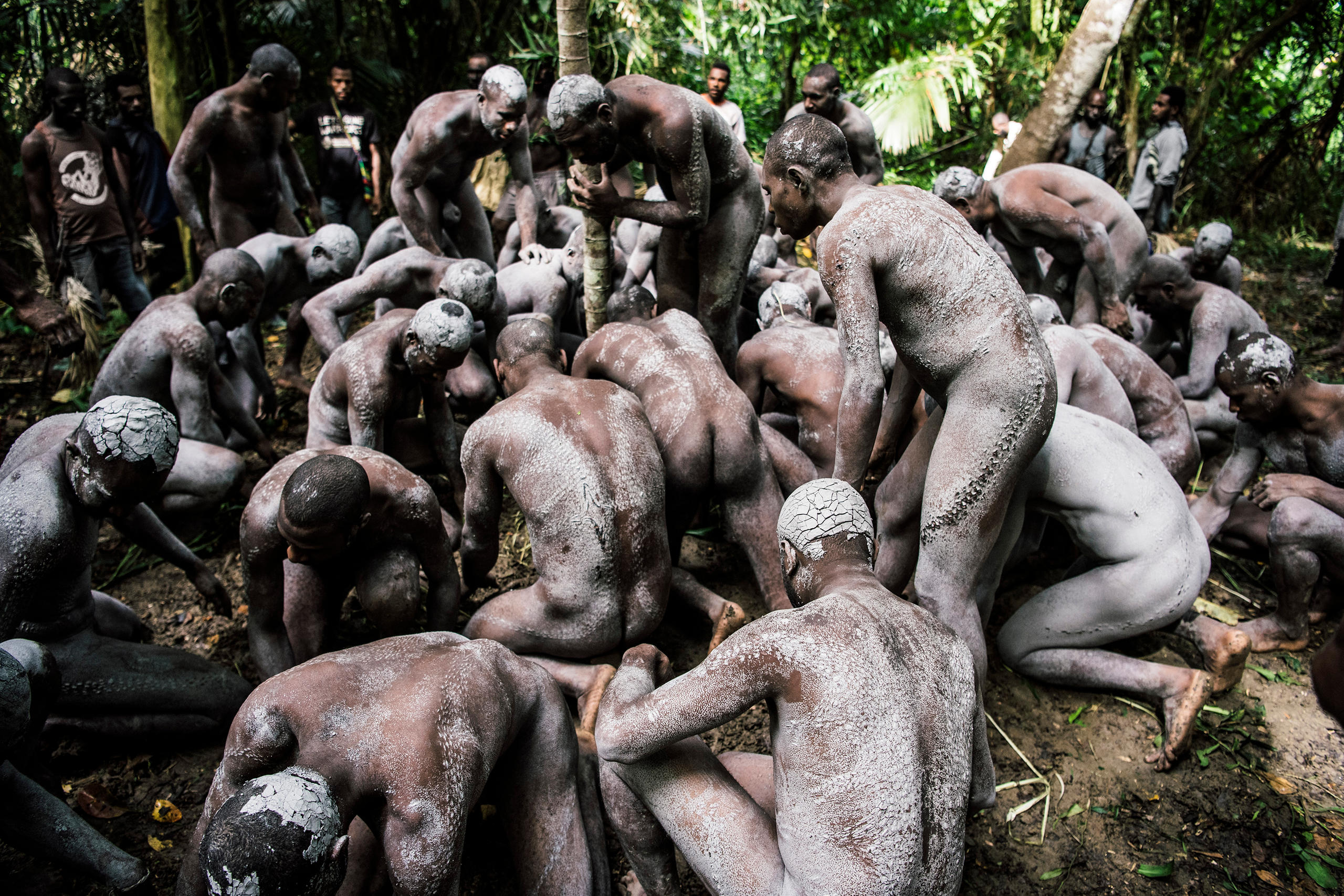 Young men during a crocodile ritual in Papua New Guinea