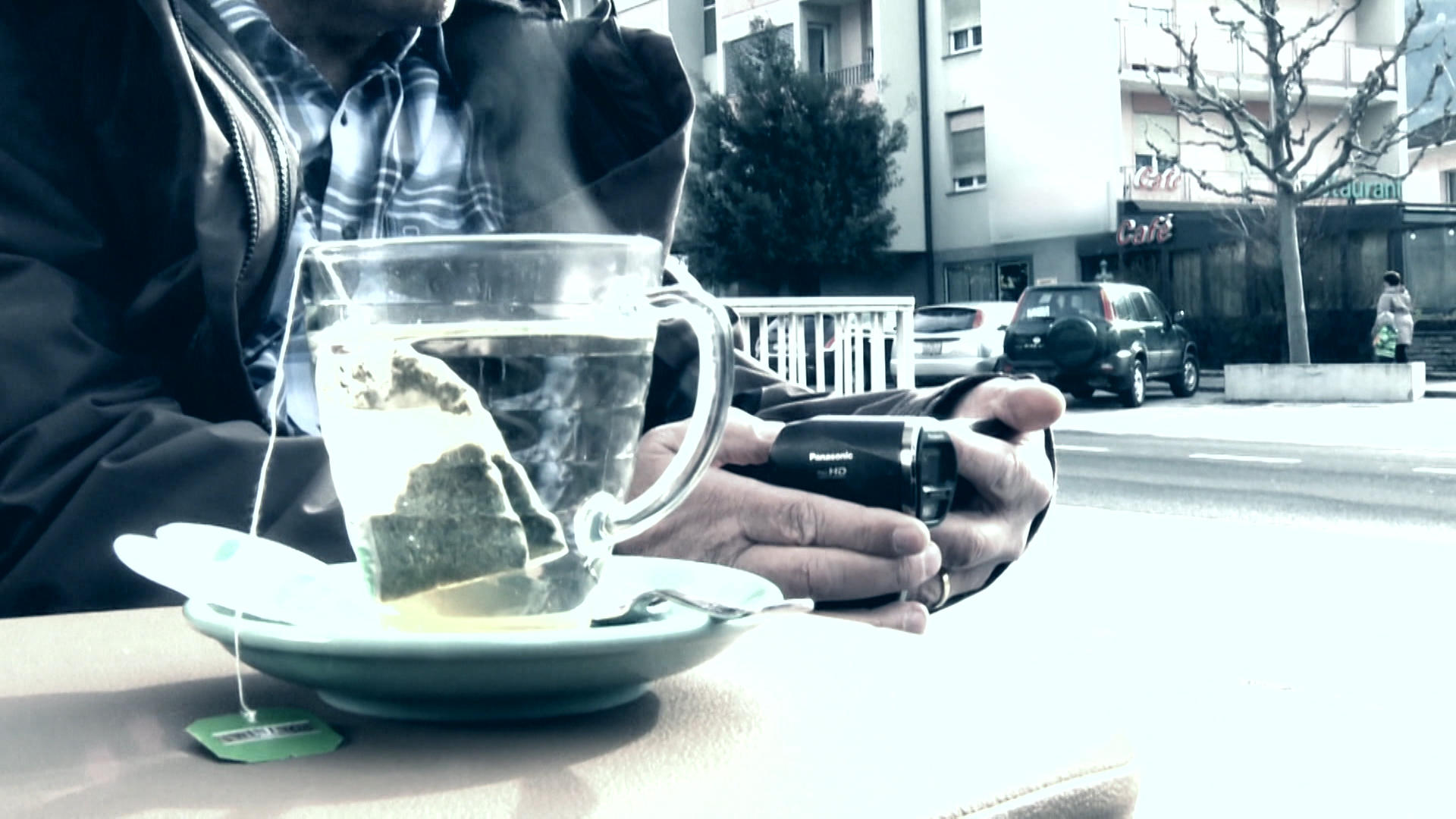 Hand holding a video camera