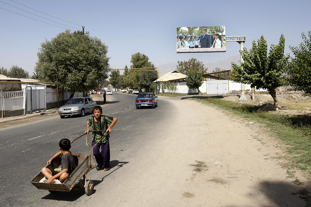 People walking on a street between Kulab and Dushanbe in Tajikistan