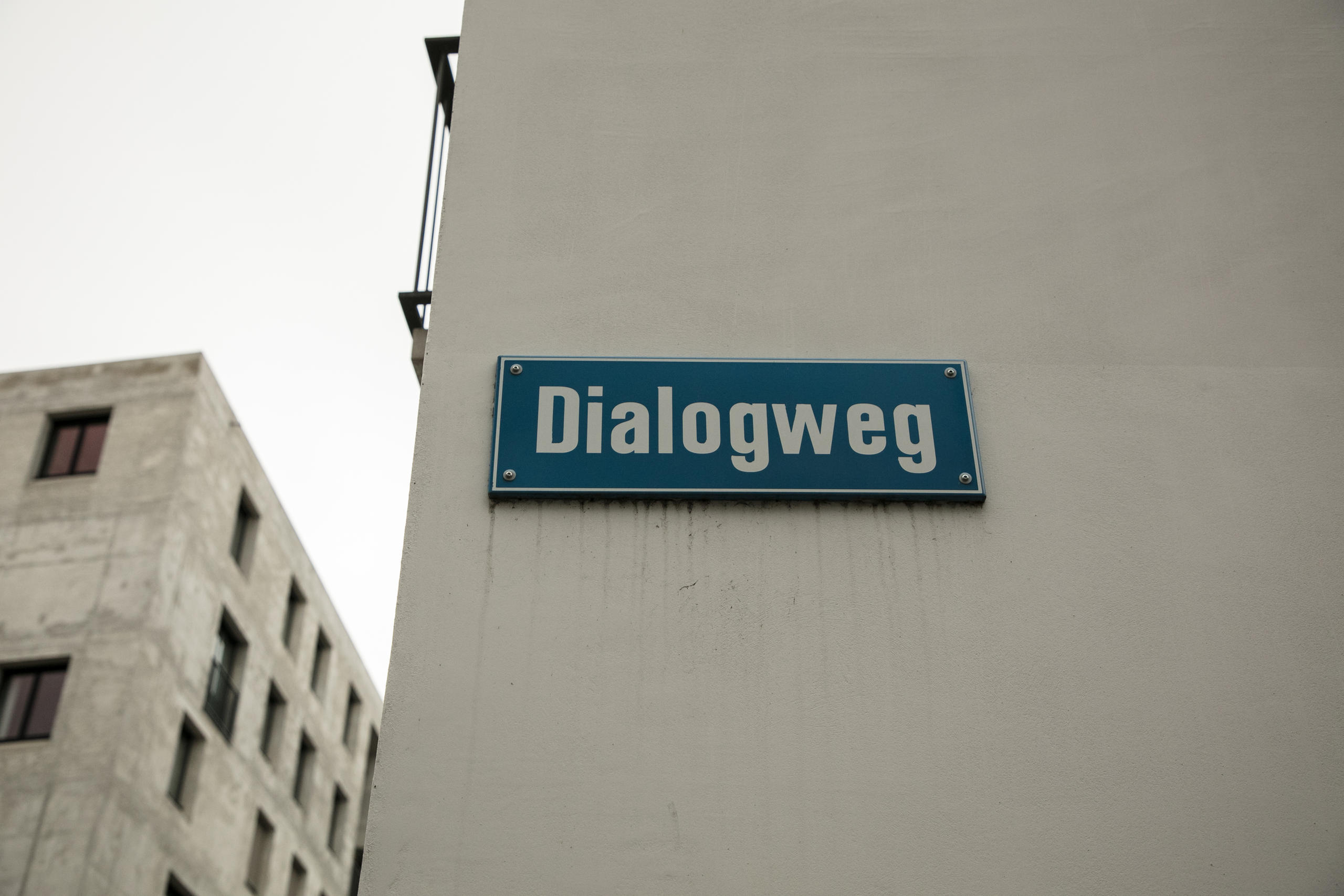 Strassenschild Dialogweg