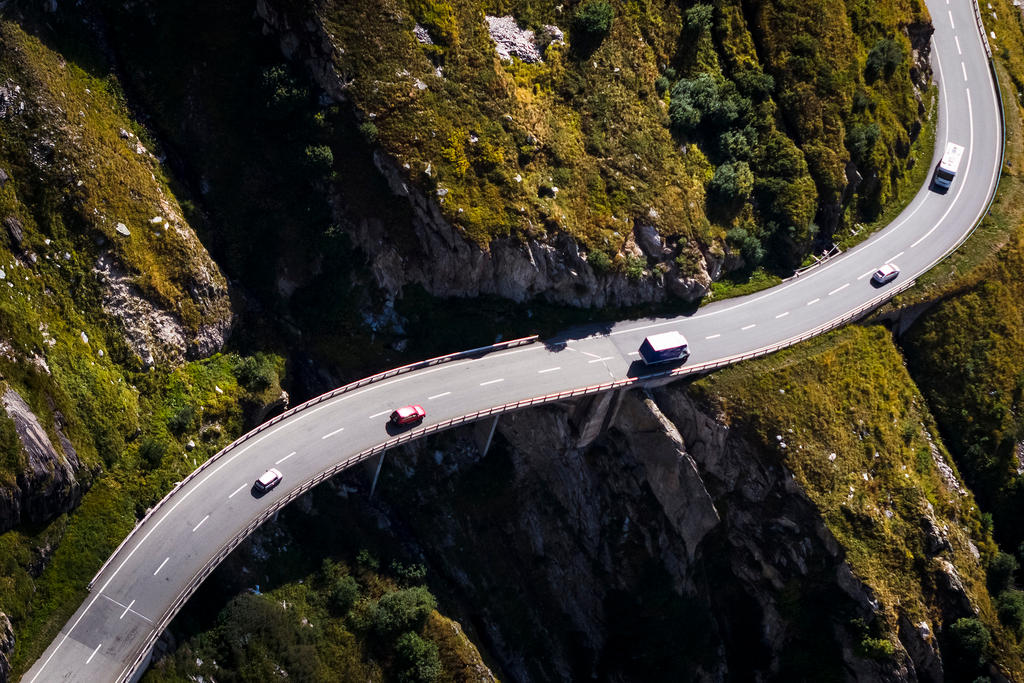 Cars make their way up the Furka Pass, peaking at an elevation of 2429 metres