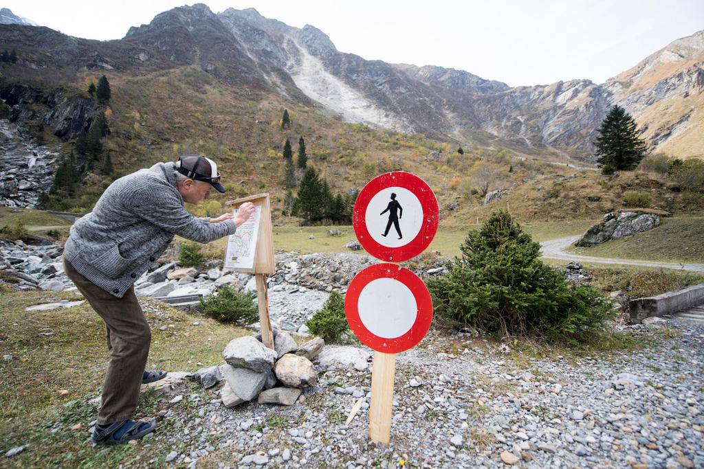 Warning sign in mountains