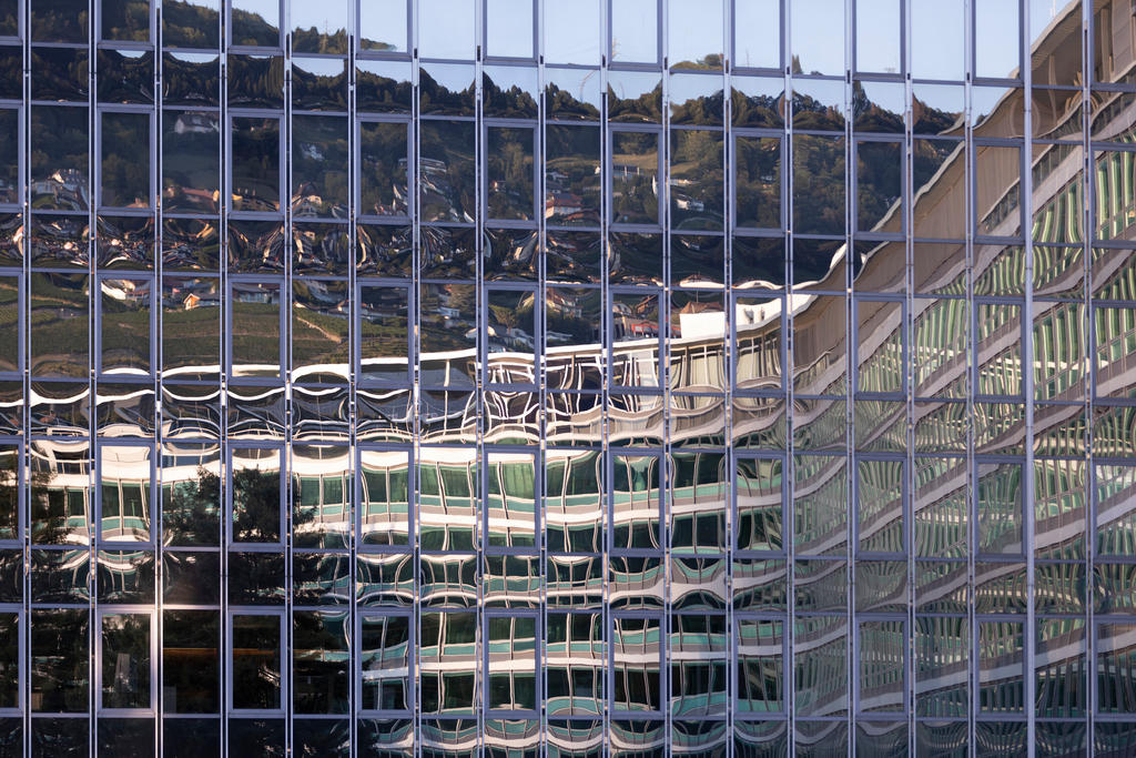 Reflection of the headquarters of Nestle in Vevey