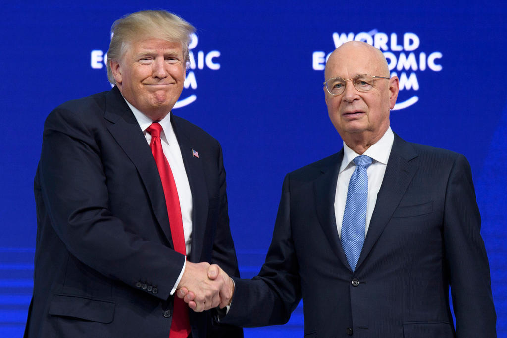 President Trump shakes the hand of WEF founder Klaus Schwab