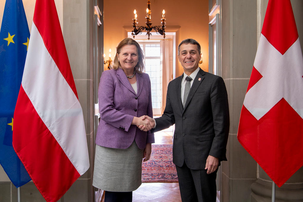 woman and man shaking hands