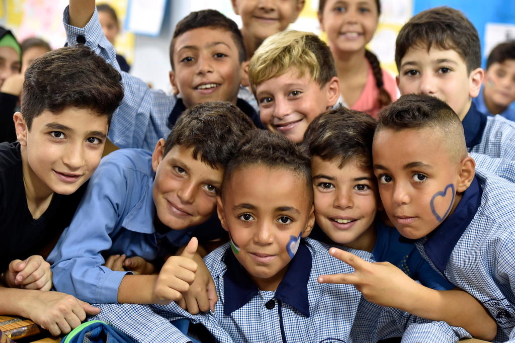 Palestinian students pose for a photo in a Kabri School, Lebanon
