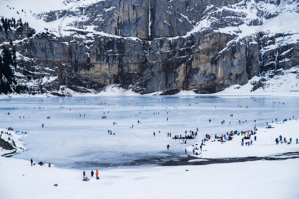 Swiss take to the ice on the frozen Oeschinen Lake, at an altitude of 1,578 metres