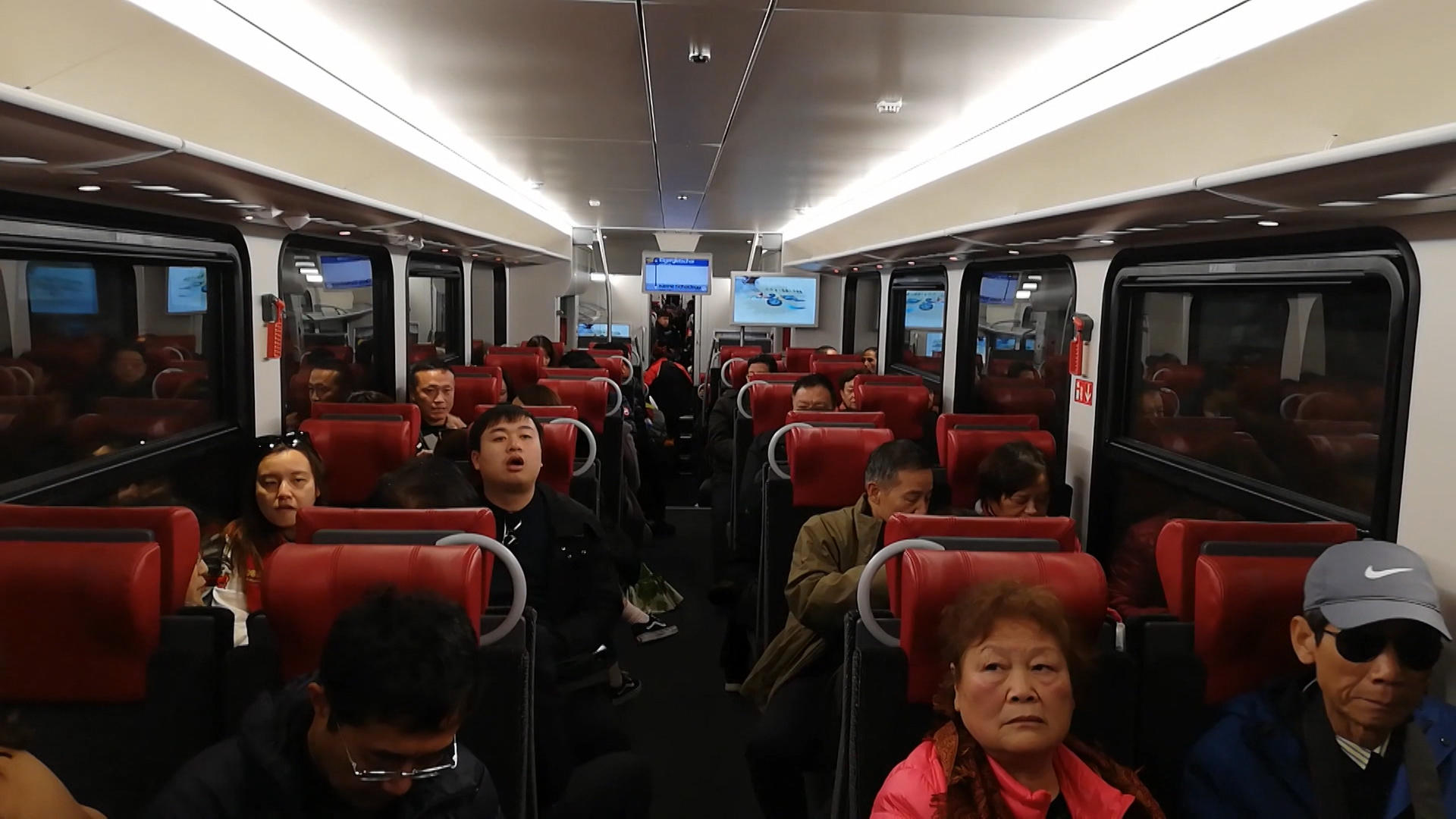 Asians on Jungfrau Railway train carriage