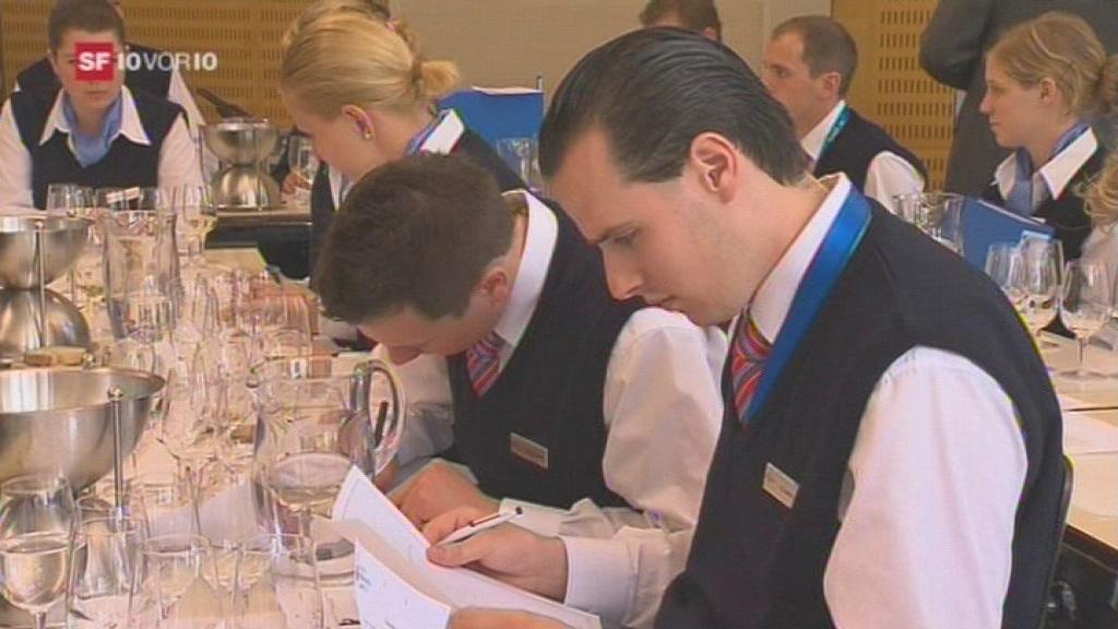 Students of the hotel management school at a course for wine tasting