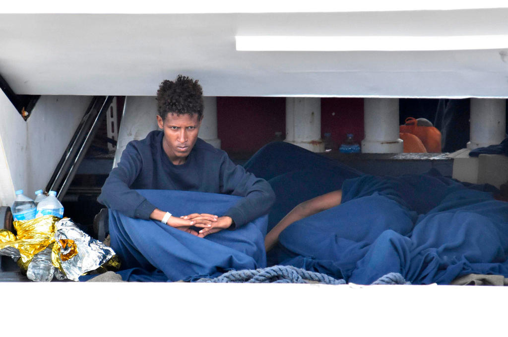 Migrant on a boat in the Mediterranean