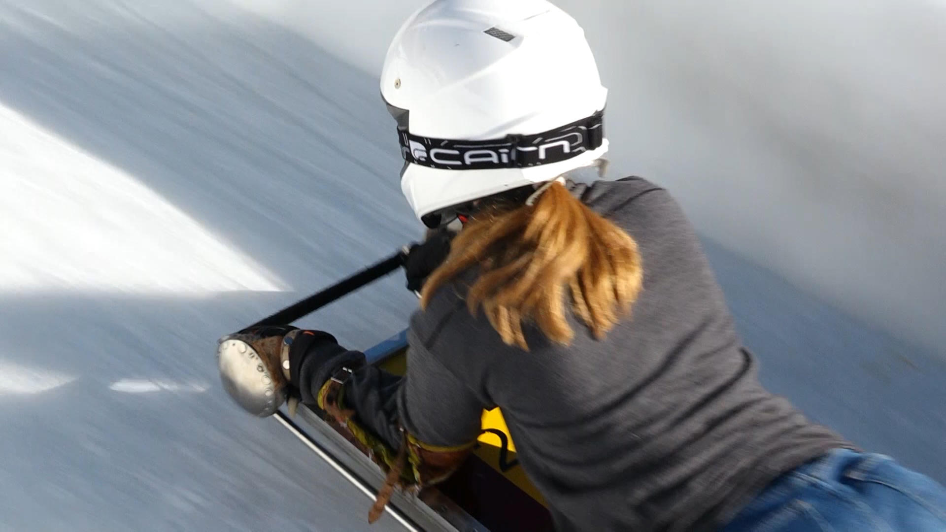 Young woman on skeleton on Cresta Run