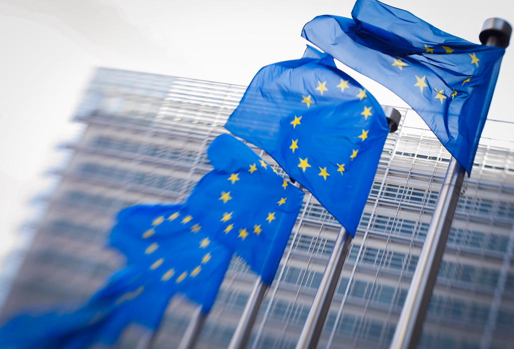 EU flags outside its headquarters in Brussels