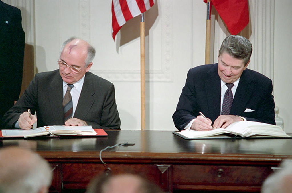 Ronald Reagan and Mikhail Gorbachev sign the INF treaty