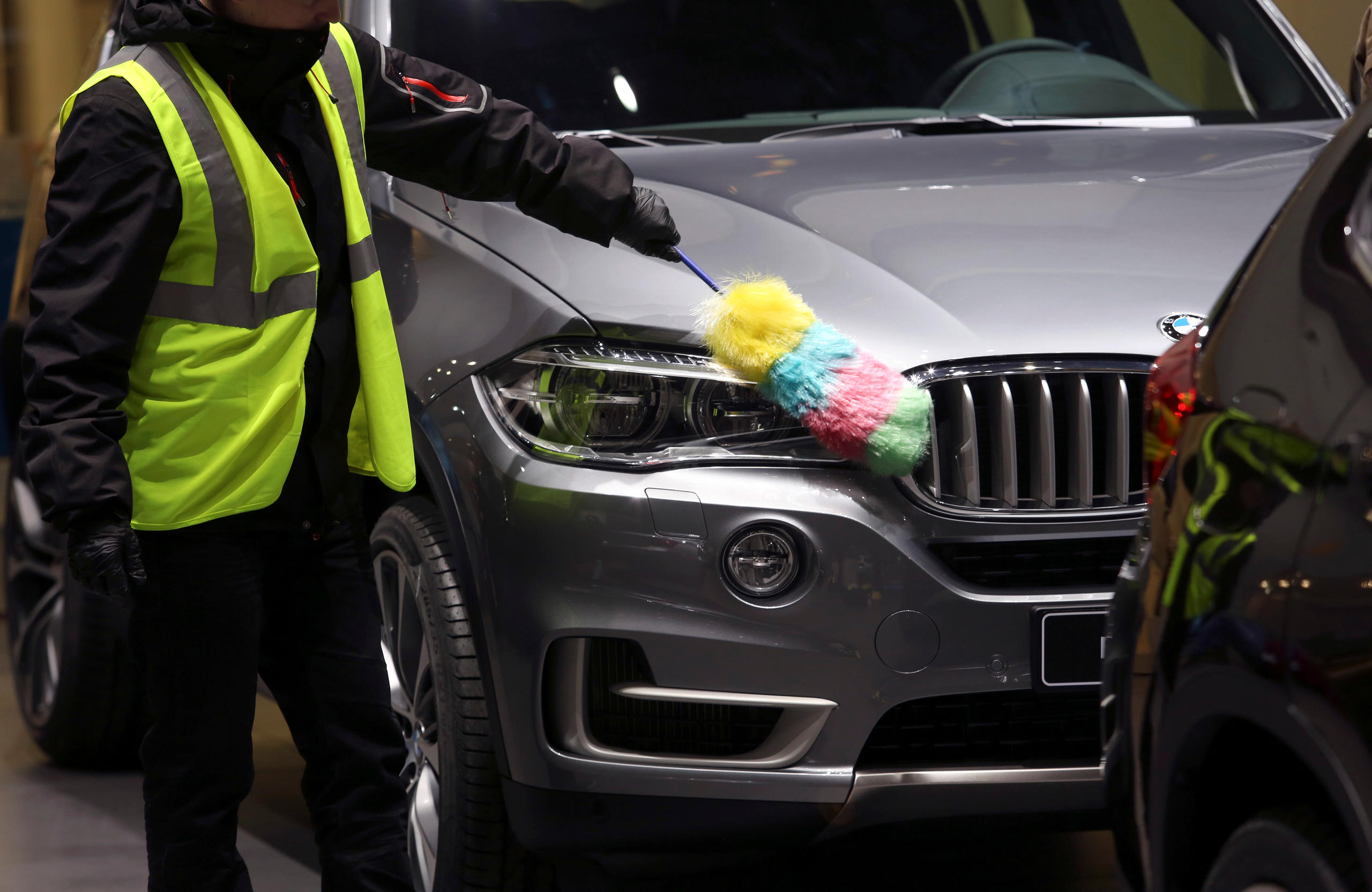 A car being cleaned at the Geneva Motor Show