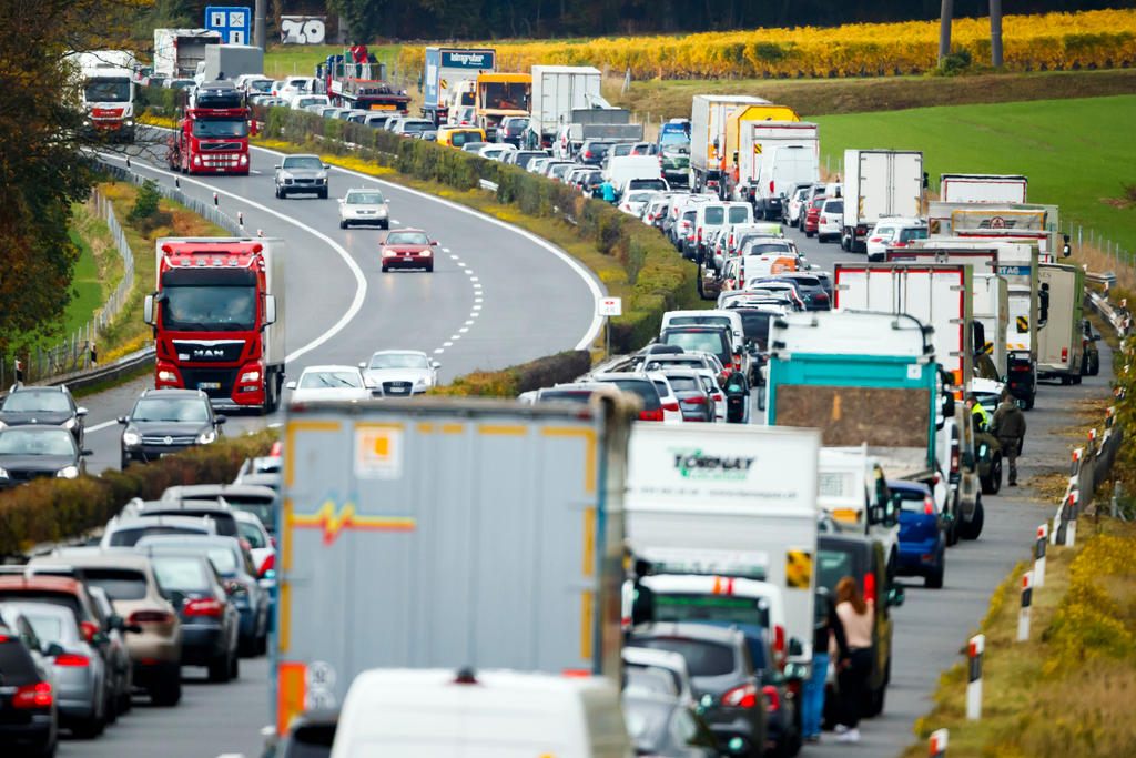 Trucks and cars on a road