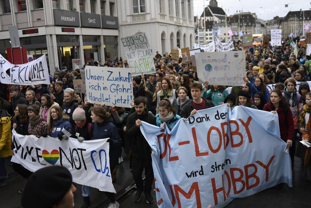 Manifestantes contra calentamiento climático