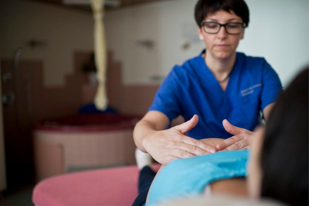 pregnant woman being examined by nurse