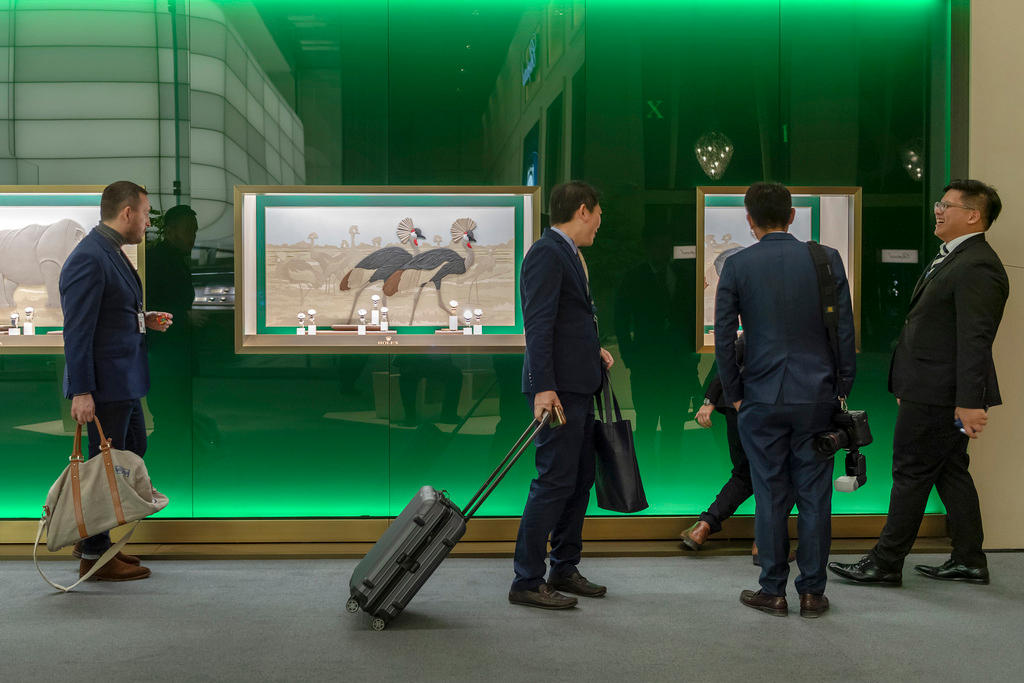 Visitors in front of the Rolex booth at Baselworld 2019