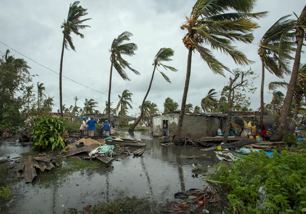 Residents inspecting the damages after cyclone Idai hit central Mozambique