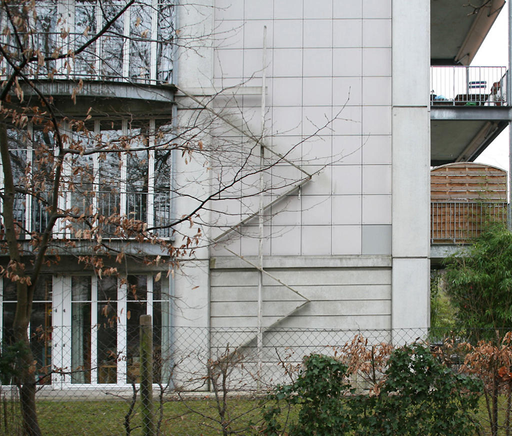 Cat ladder from the second floor at the side of a modern housing block.