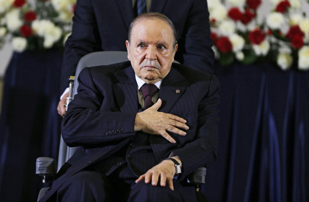 Bouteflika in a wheelchair in 2014