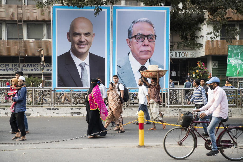 Poster of Swiss and Bangladeshi presidents in Bangladesh street