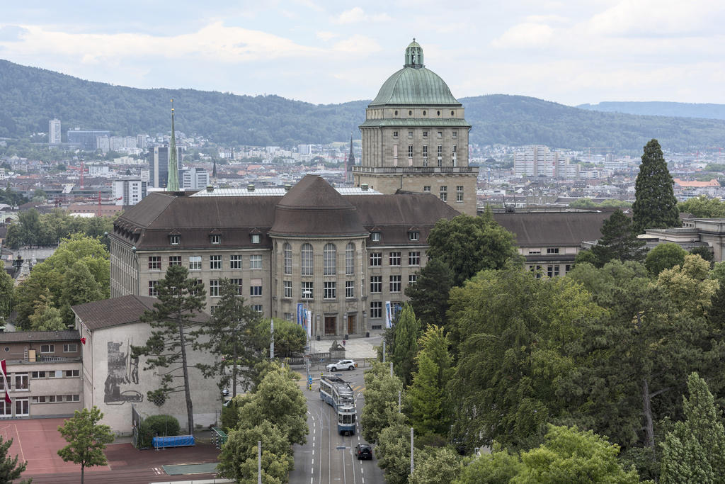 The main building of the University of Zurich with the city of Zurich in the background