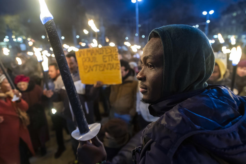 Demonstration with people with torches