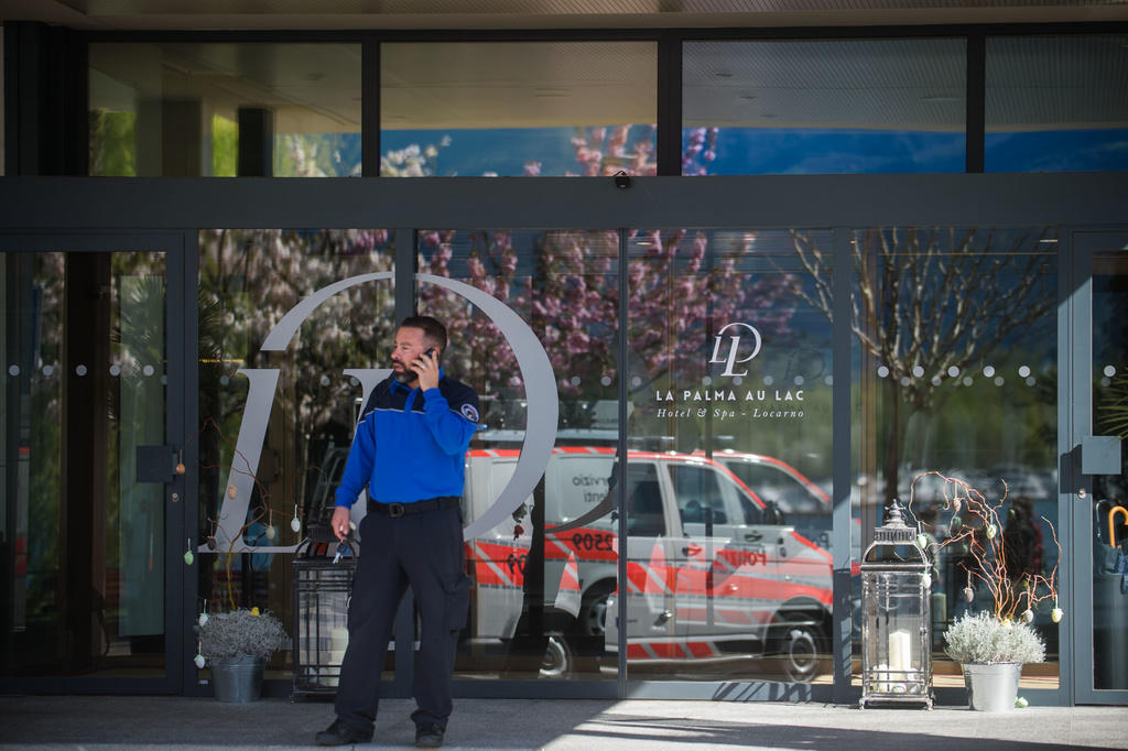 A policeman guards the Hotel La Palma au Lac in Muralto, canton Ticino