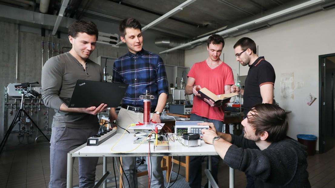 men in a lab