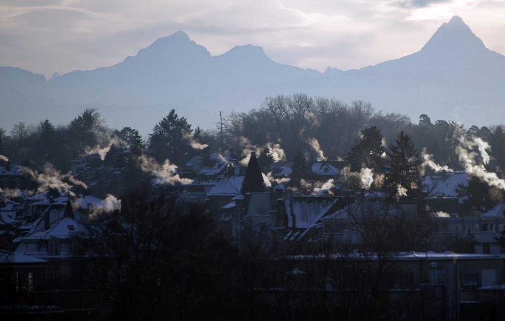 smoking chimneys on a cold winter morning