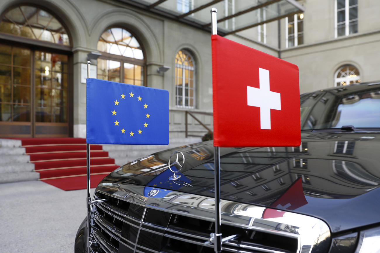 Car bearing EU and Swiss flags