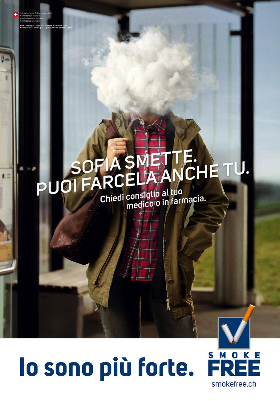 Man with head in a cloud of smoke
