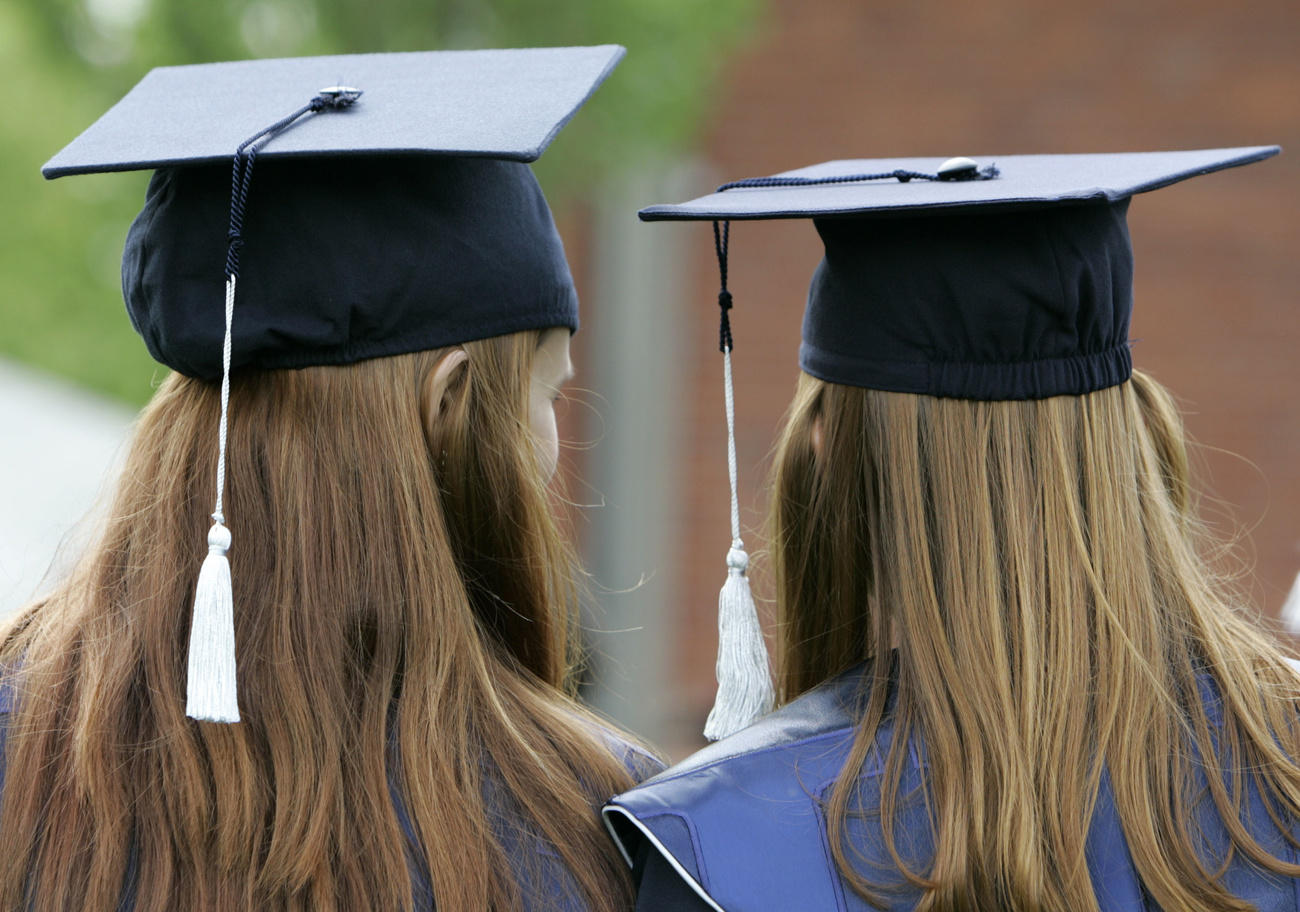 Two women graduating