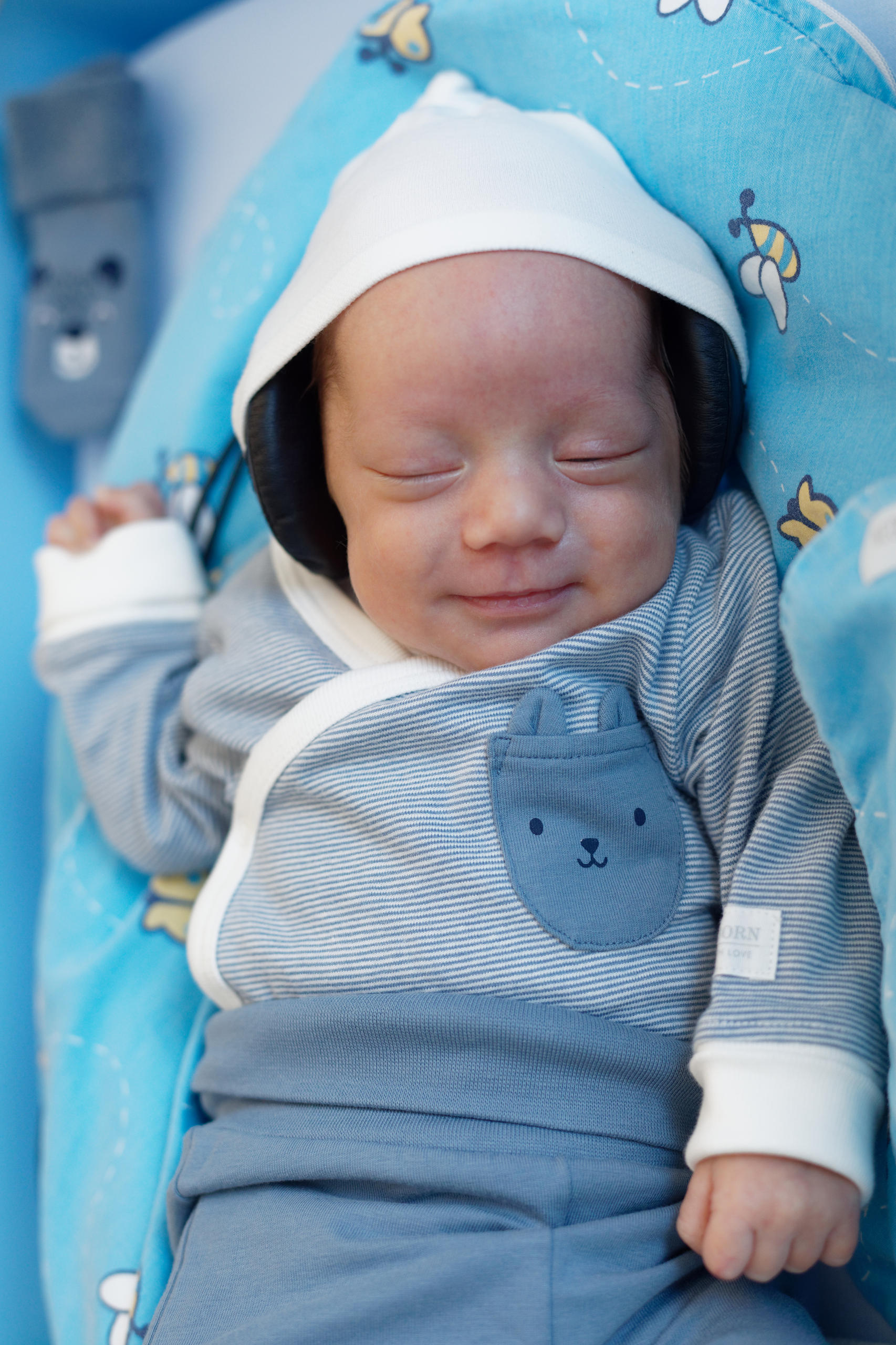 smiling face of a prematurely born baby