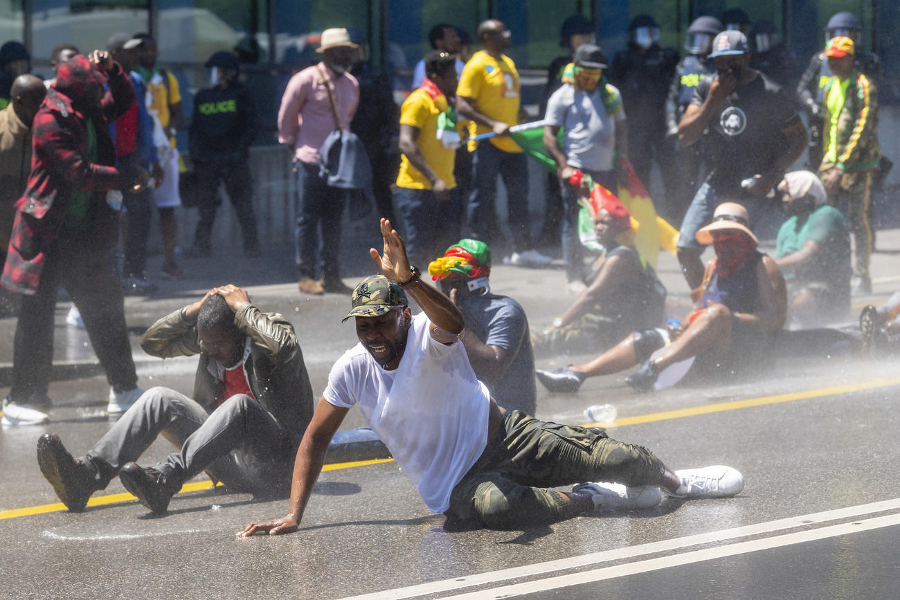 Police repel Cameroonian protesters with tear gas and water cannon