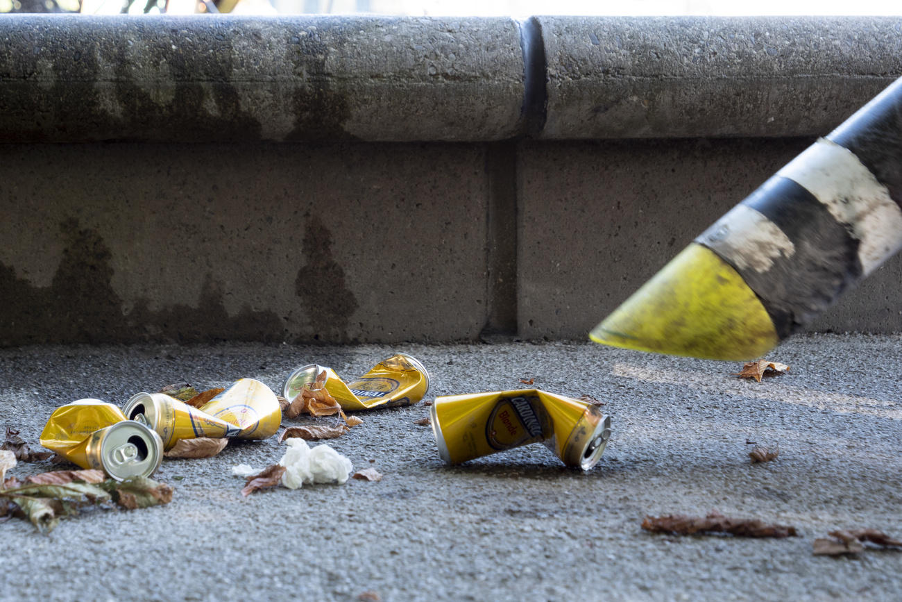 cans being swept up