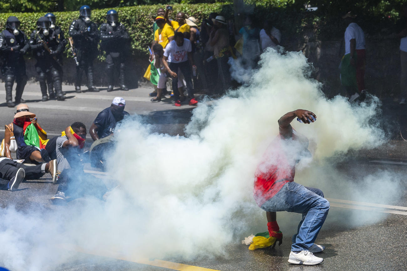 Cameroonian protesters getting tear gassed