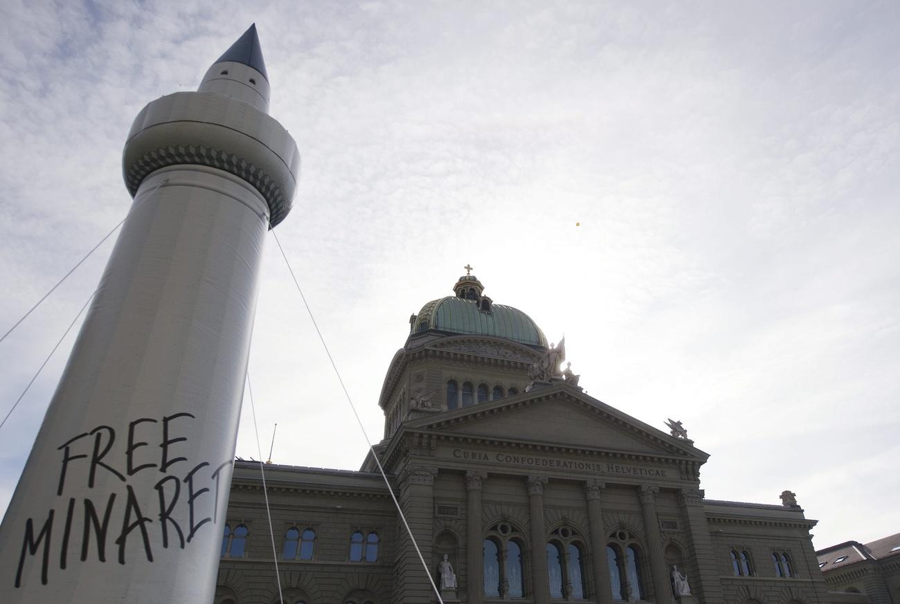 Minaret with the words Free Minarets written on it