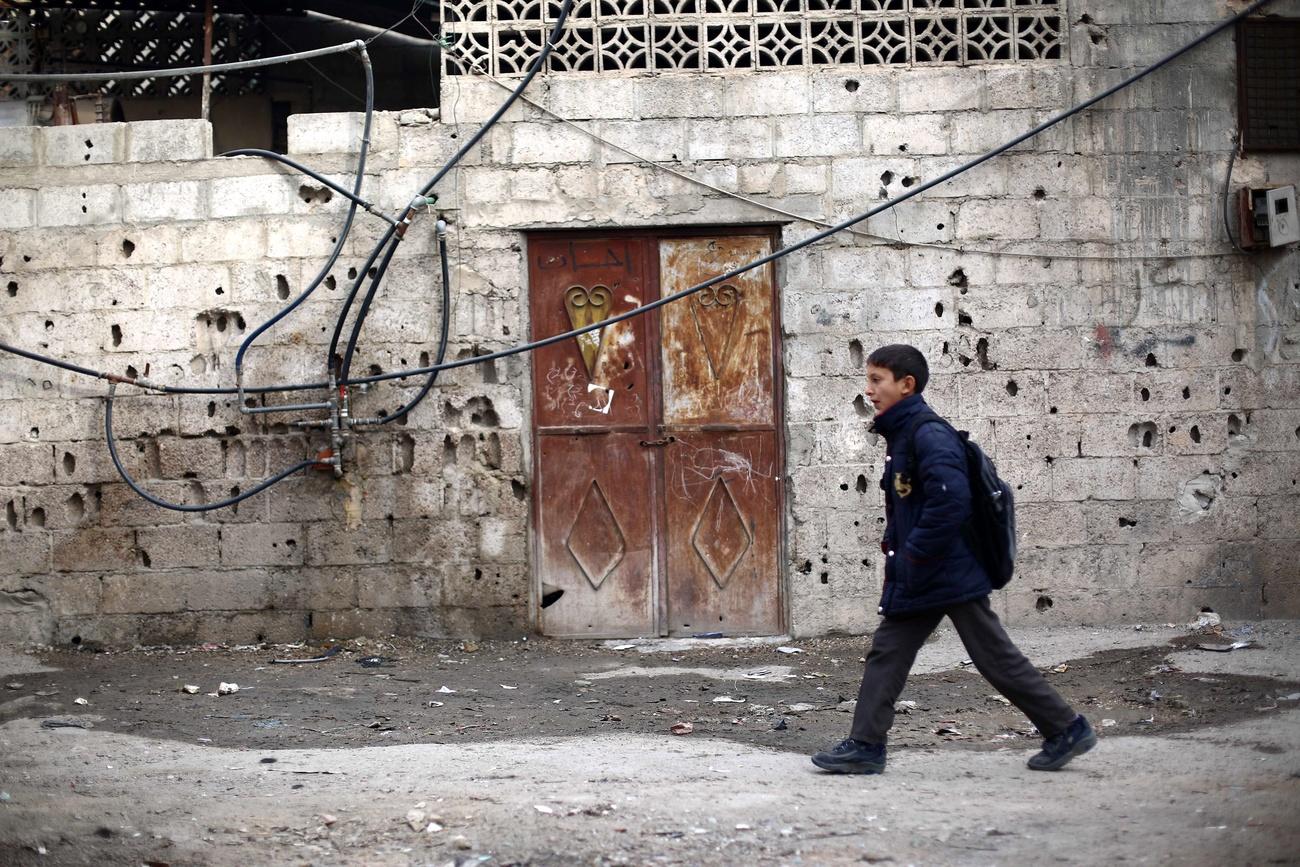 Syrian child in war-torn area of Damascus